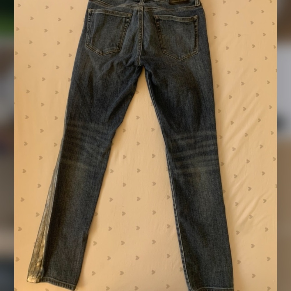 Lucky brand medium wash with silver stripe on side